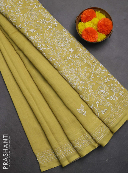 Khadi linen cotton saree lime yellow with embroidery buttas and kantha stitch work pallu & border