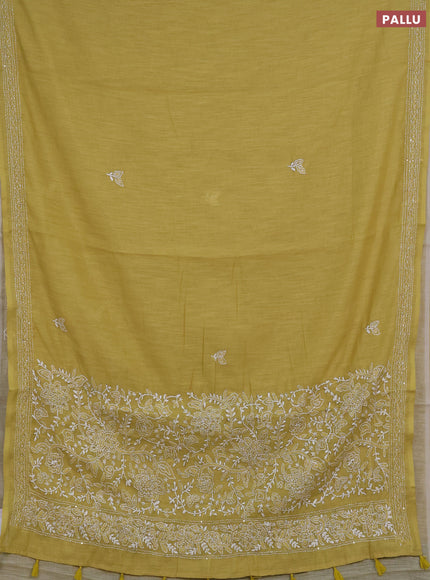 Khadi linen cotton saree lime yellow with embroidery buttas and kantha stitch work pallu & border
