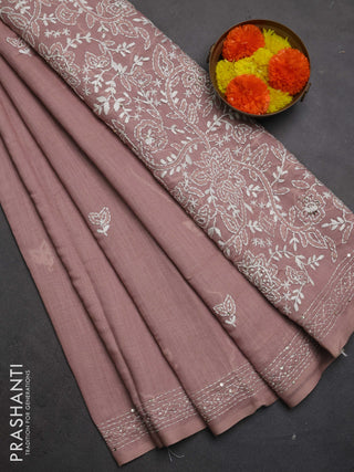 Khadi linen cotton saree pastel pink shade with embroidery buttas and kantha stitch work pallu & border