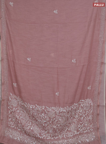 Khadi linen cotton saree pastel pink shade with embroidery buttas and kantha stitch work pallu & border