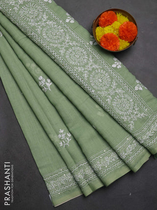 Khadi linen cotton saree pastel green with floral embroidery buttas and kantha stitch work pallu & border