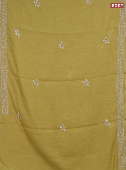 Khadi linen cotton saree lime yellow with floral embroidery buttas and kantha stitch work pallu & border