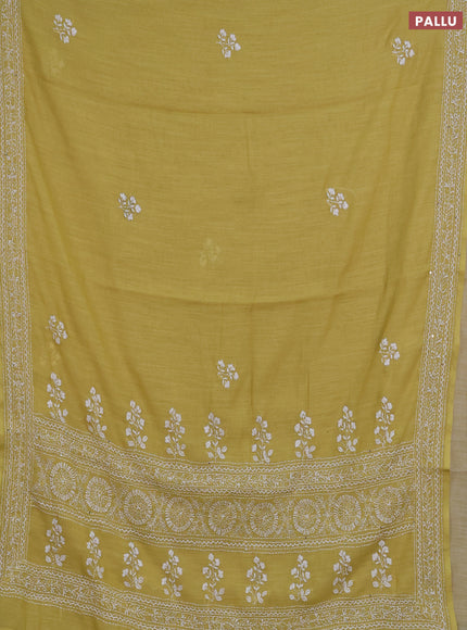 Khadi linen cotton saree lime yellow with floral embroidery buttas and kantha stitch work pallu & border