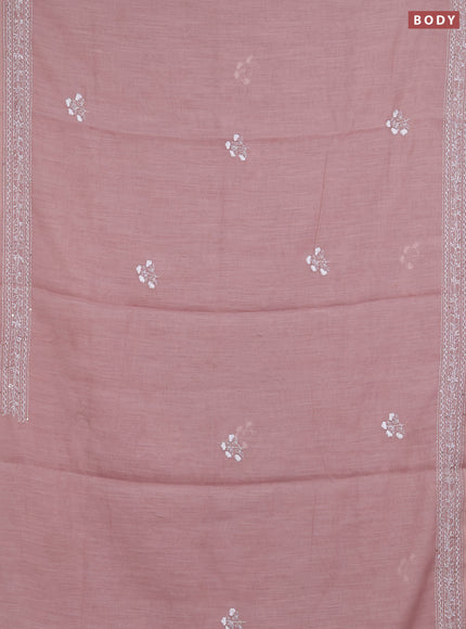 Khadi linen cotton saree pastel pink shade with floral embroidery buttas and kantha stitch work pallu & border