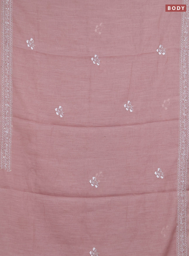 Khadi linen cotton saree pastel pink shade with floral embroidery buttas and kantha stitch work pallu & border