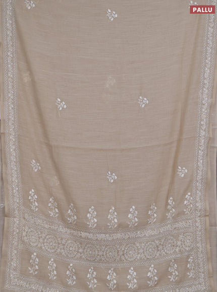 Khadi linen cotton saree beige with floral embroidery buttas and kantha stitch work pallu & border