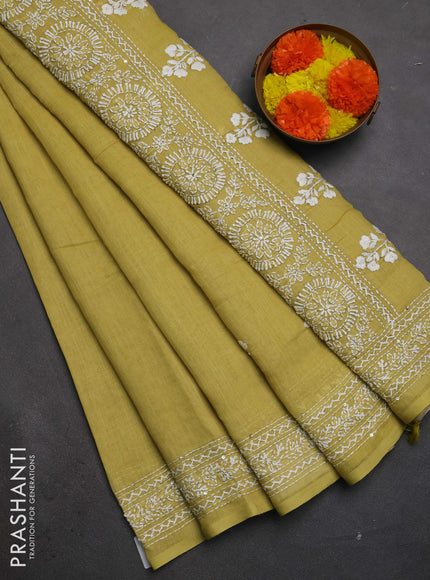 Khadi linen cotton saree lime yellow with floral embroidery buttas and kantha stitch work pallu & border
