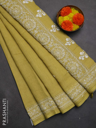 Khadi linen cotton saree lime yellow with floral embroidery buttas and kantha stitch work pallu & border