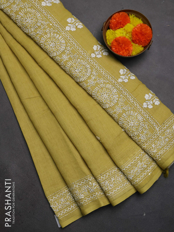 Khadi linen cotton saree lime yellow with floral embroidery buttas and kantha stitch work pallu & border