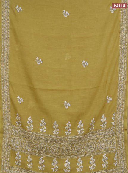 Khadi linen cotton saree lime yellow with floral embroidery buttas and kantha stitch work pallu & border