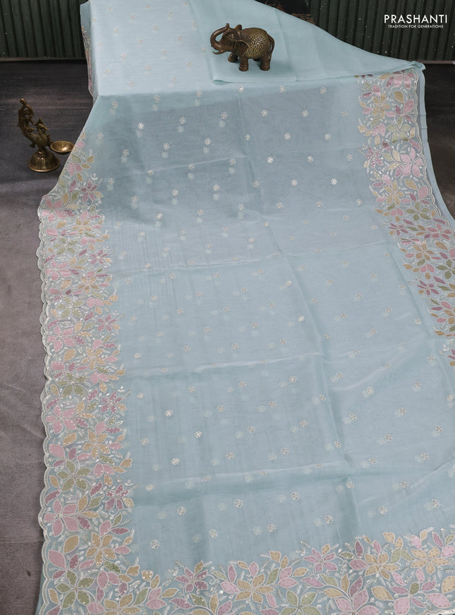 Organza saree light blue with embroidery sequin buttas and floral sequin embroidery border