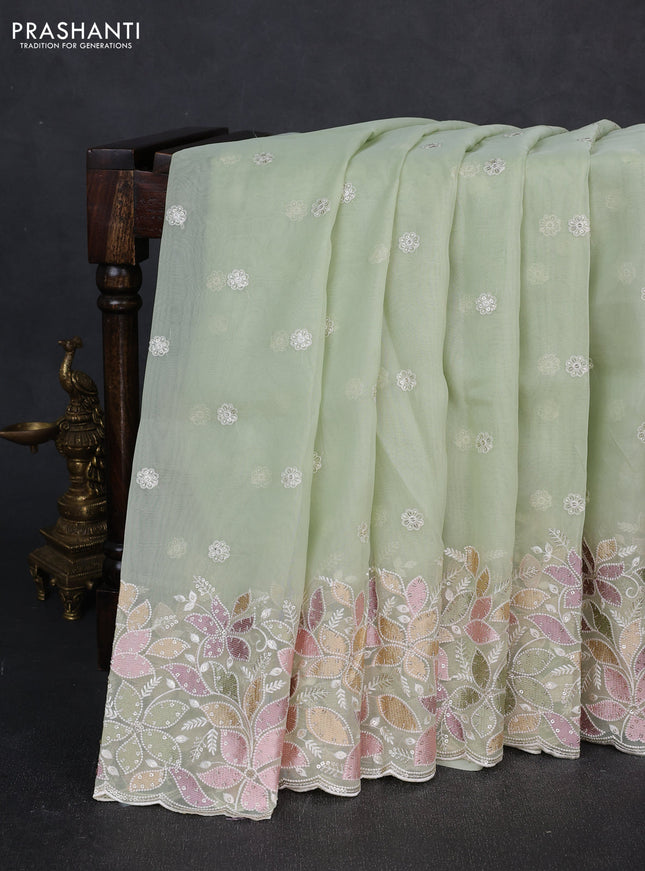 Organza saree pista green with embroidery sequin buttas and floral sequin embroidery border