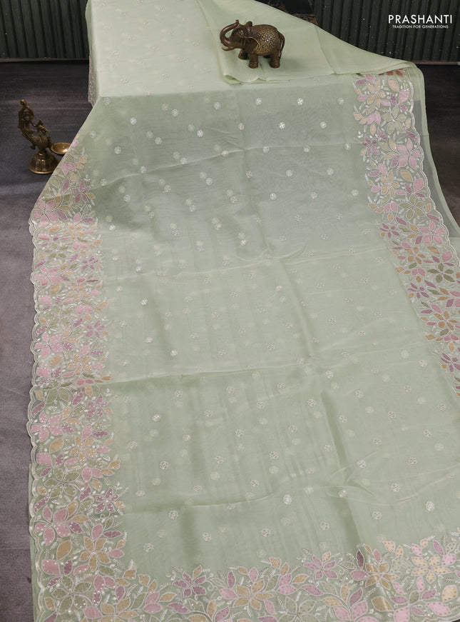 Organza saree pista green with embroidery sequin buttas and floral sequin embroidery border