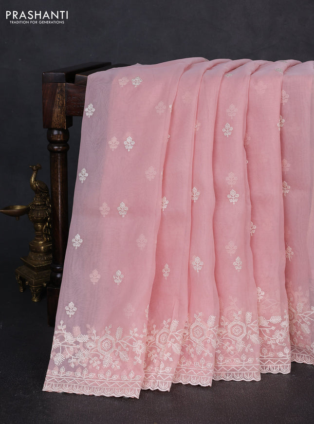 Organza saree mild peach pink with embroidery buttas and embroidery border