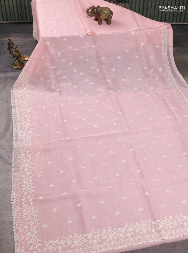Organza saree mild peach pink with embroidery buttas and embroidery border