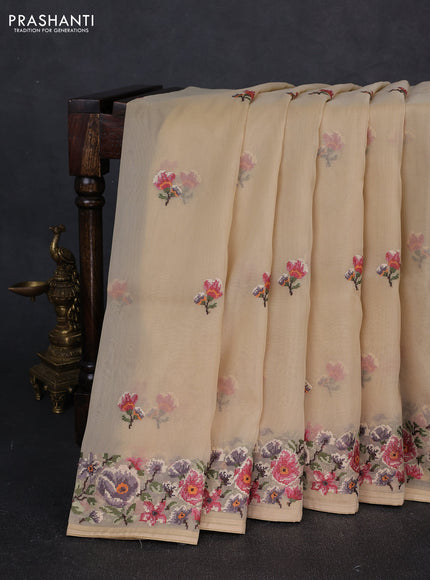 Organza saree beige with embroidery buttas and convent embroidery border