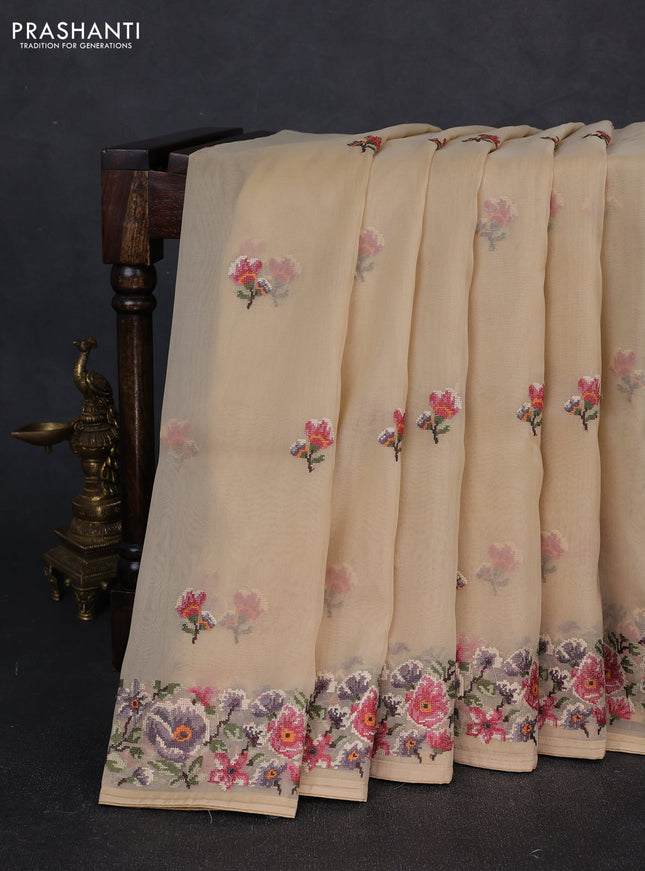 Organza saree beige with embroidery buttas and convent embroidery border