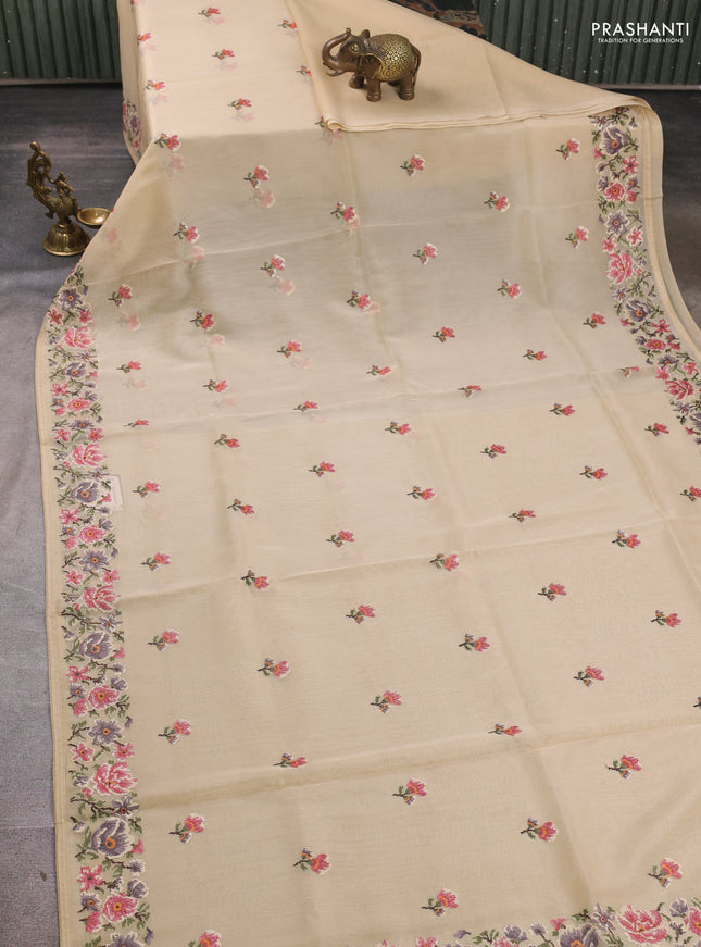 Organza saree beige with embroidery buttas and convent embroidery border