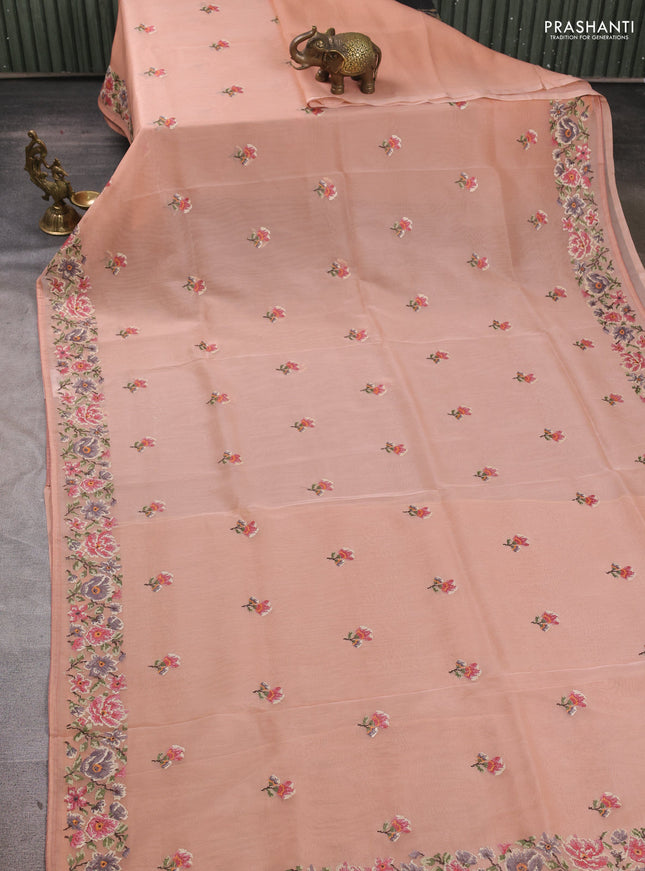 Organza saree pastel peach with embroidery buttas and convent embroidery border