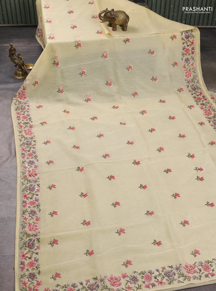 Organza saree pale yellow with embroidery buttas and convent embroidery border