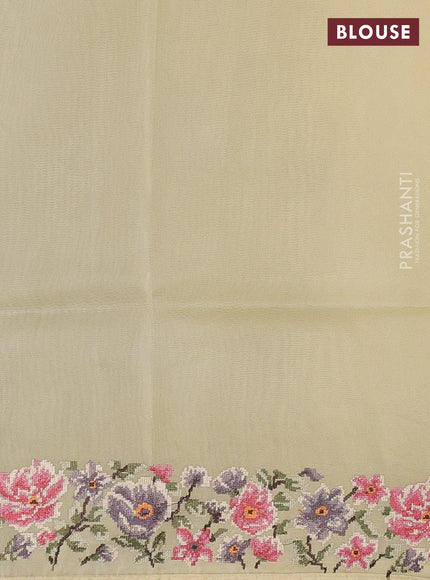 Organza saree pale yellow with embroidery buttas and convent embroidery border