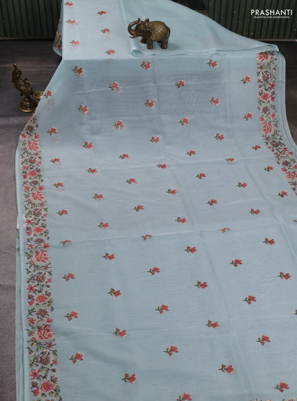 Organza saree light blue with embroidery buttas and convent embroidery border