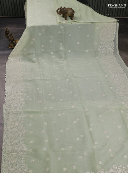 Organza saree pista green with embroidery buttas and floral embroidery border