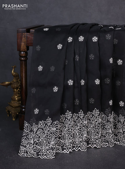 Organza saree black with embroidery buttas and floral embroidery border