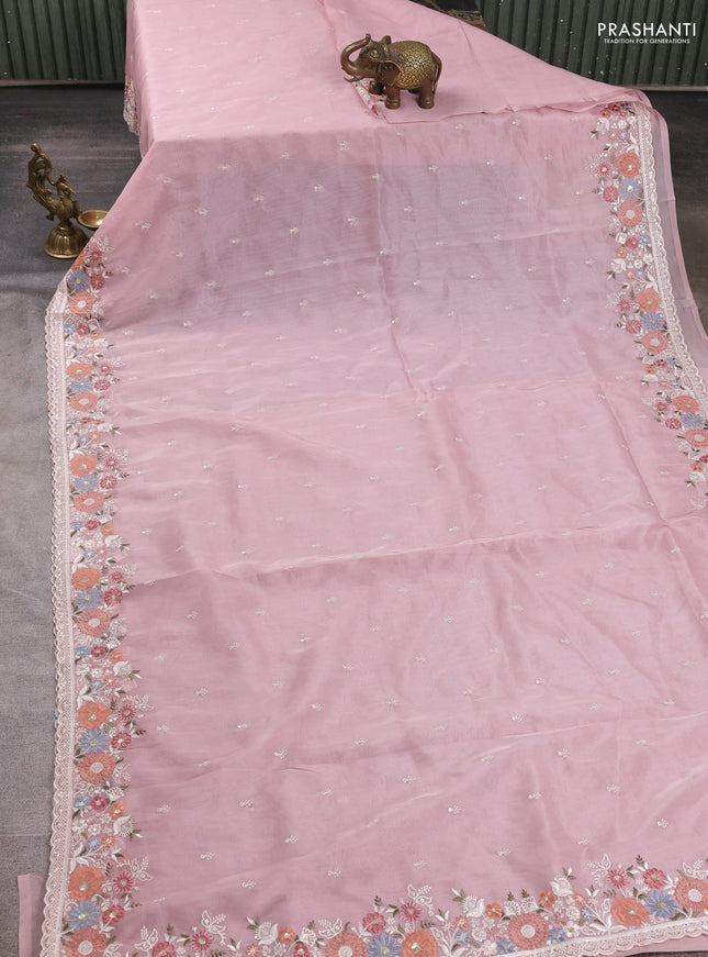 Organza saree pastel pink with embroidery buttas and embroidery border