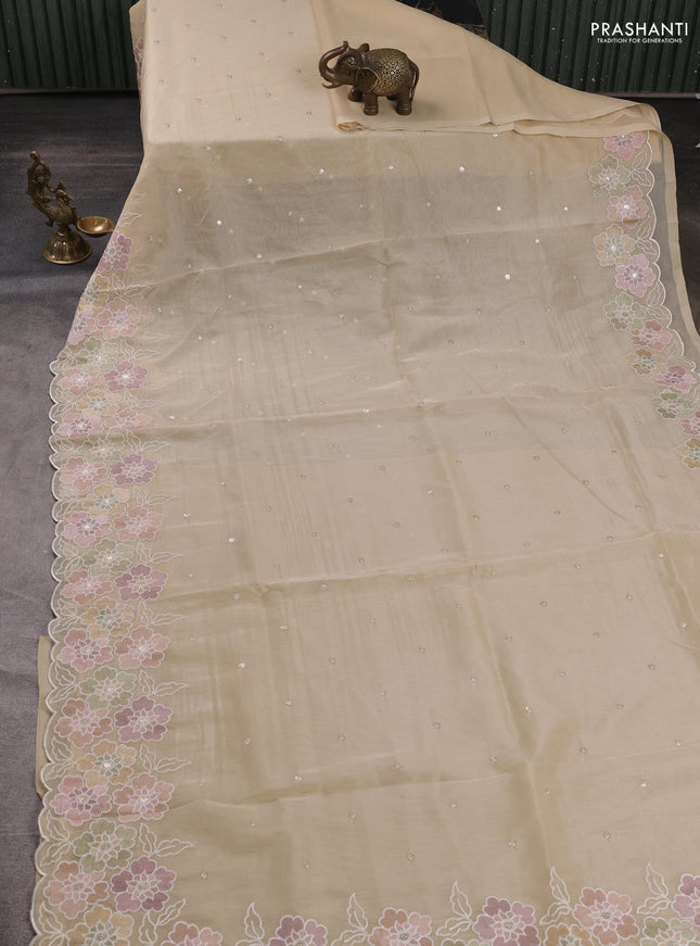 Organza saree beige with sequin embroidery buttas and floral embroidery border