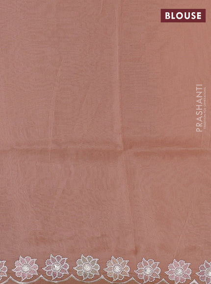 Organza saree peach shade with sequin embroidery buttas and floral embroidery border
