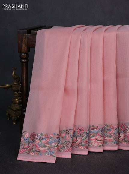Organza saree peach pink shade with plain body and convent embroidery border