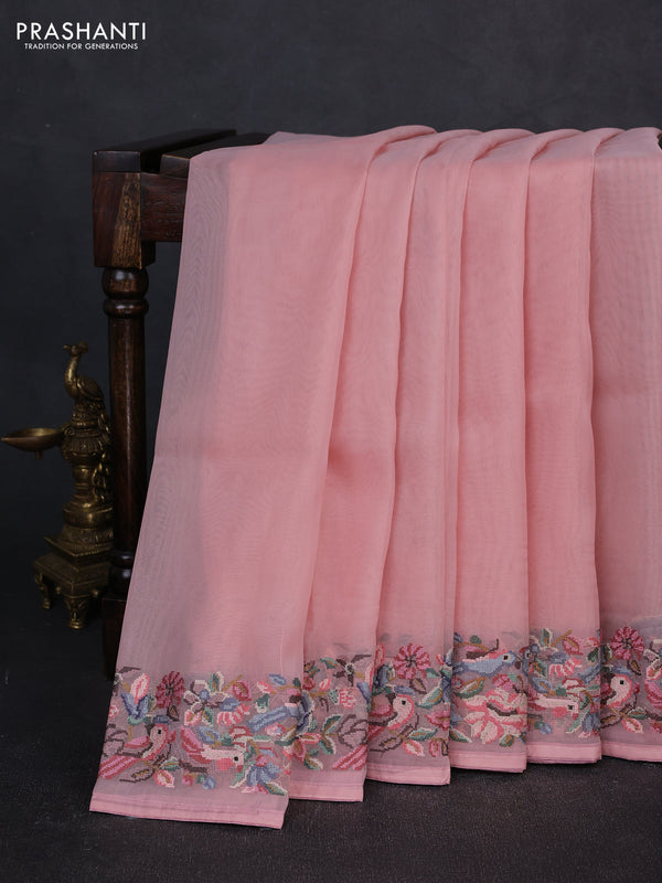Organza saree peach pink shade with plain body and convent embroidery border