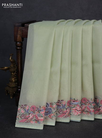 Organza saree pista green with plain body and convent embroidery border