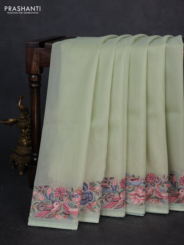 Organza saree pista green with plain body and convent embroidery border