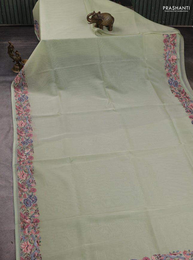 Organza saree pista green with plain body and convent embroidery border