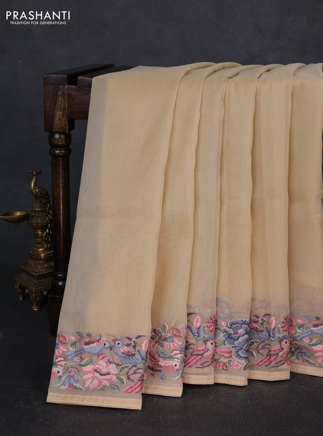Organza saree beige with plain body and convent embroidery border