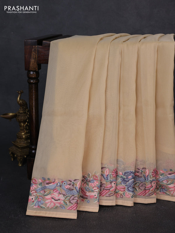 Organza saree beige with plain body and convent embroidery border