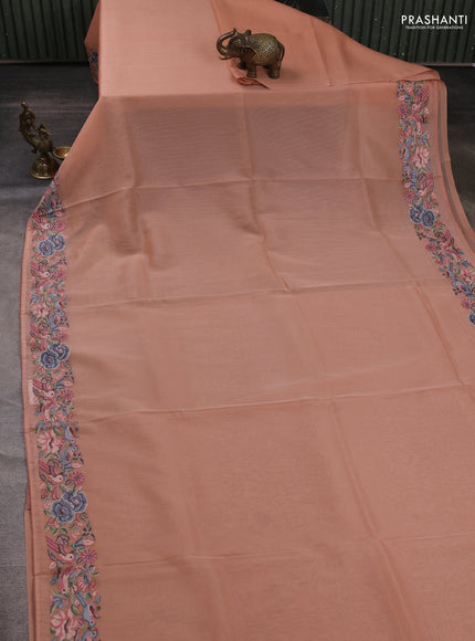 Organza saree peach shade with plain body and convent embroidery border