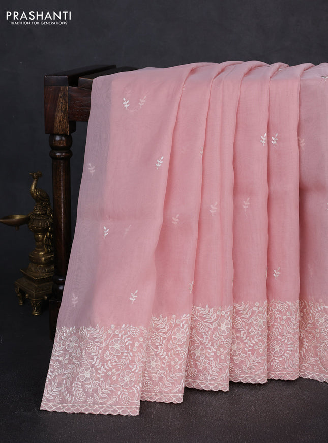 Organza saree peach shade with embroidery buttas and embroidery border