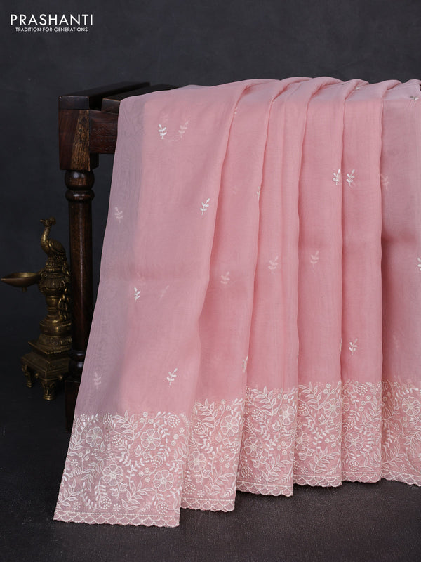 Organza saree peach shade with embroidery buttas and embroidery border