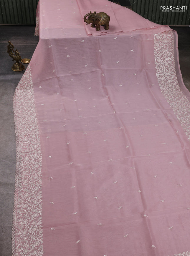 Organza saree pastel pink shade with embroidery buttas and embroidery border