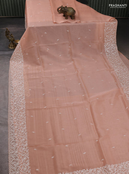 Organza saree pastel peach with embroidery buttas and embroidery border