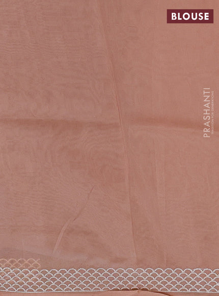 Organza saree pastel peach with embroidery buttas and embroidery border
