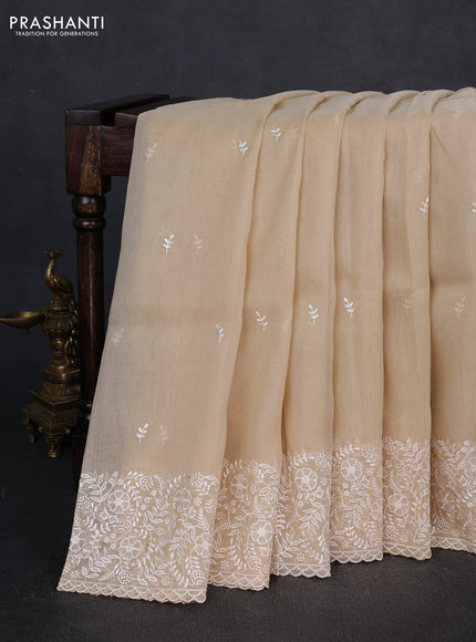 Organza saree beige with embroidery buttas and embroidery border