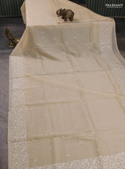 Organza saree beige with embroidery buttas and embroidery border