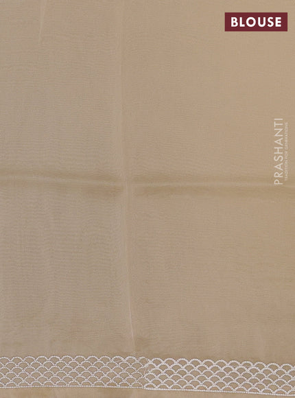 Organza saree beige with embroidery buttas and embroidery border