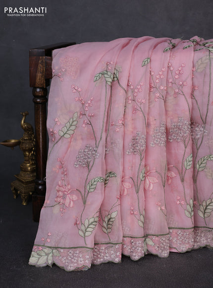 Tissue organza saree pastel pink with allover floral embroidery and embroidery border