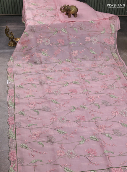 Tissue organza saree pastel pink with allover floral embroidery and embroidery border