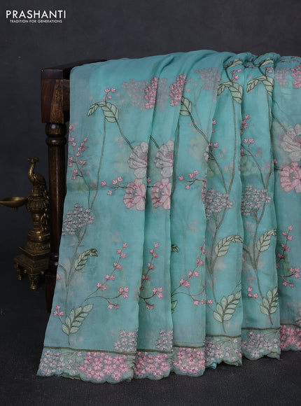 Tissue organza saree teal blue with allover floral embroidery and embroidery border